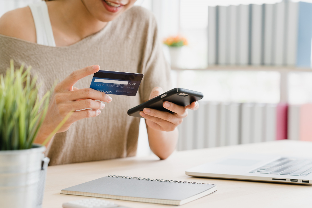 A Woman Using Smartphone Buying Online Shopping