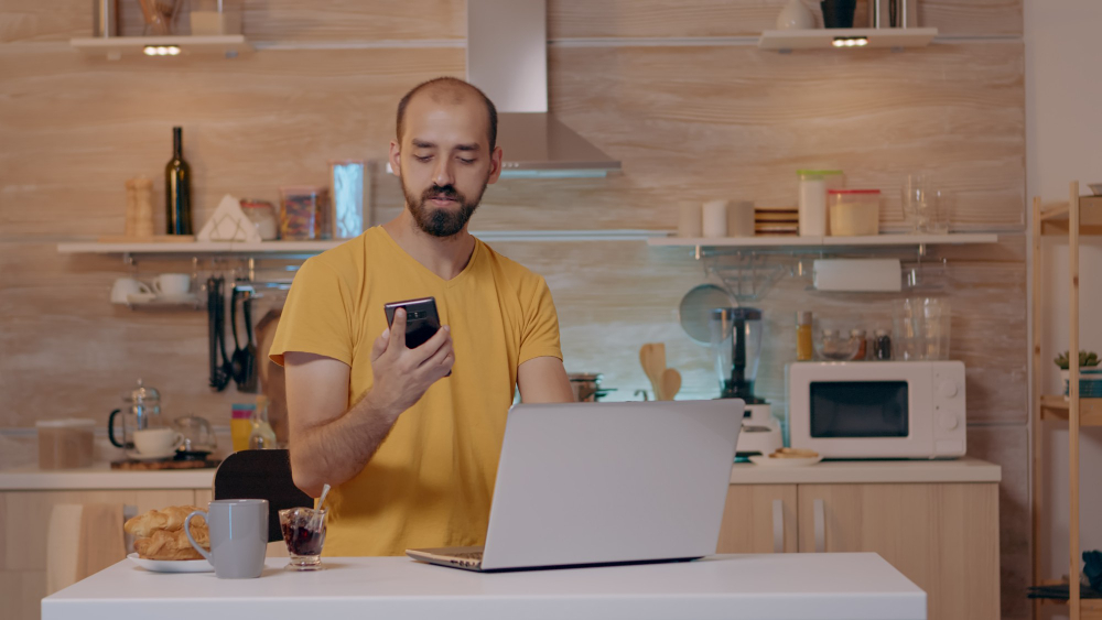 Man Working From House With Automation Lighting System